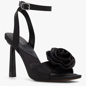 Call It Spring Bonitaa Heeled Sandals in Black Satin with Floral Accent